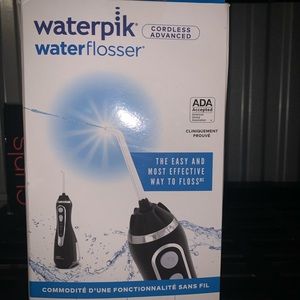 New in box water flosser cordless